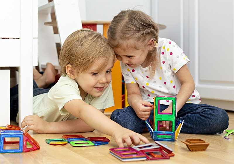 Мозаика развития ребенка. Child playing with Toys. Kindergarten children standing. Agnry child playing Phone. Kindergarten Kids standing.